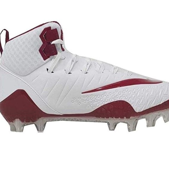 green and white football cleats